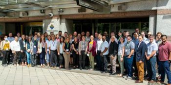 Group photo of 2022 New Faculty Workshop participants and facilitators in front of ACS headquarters