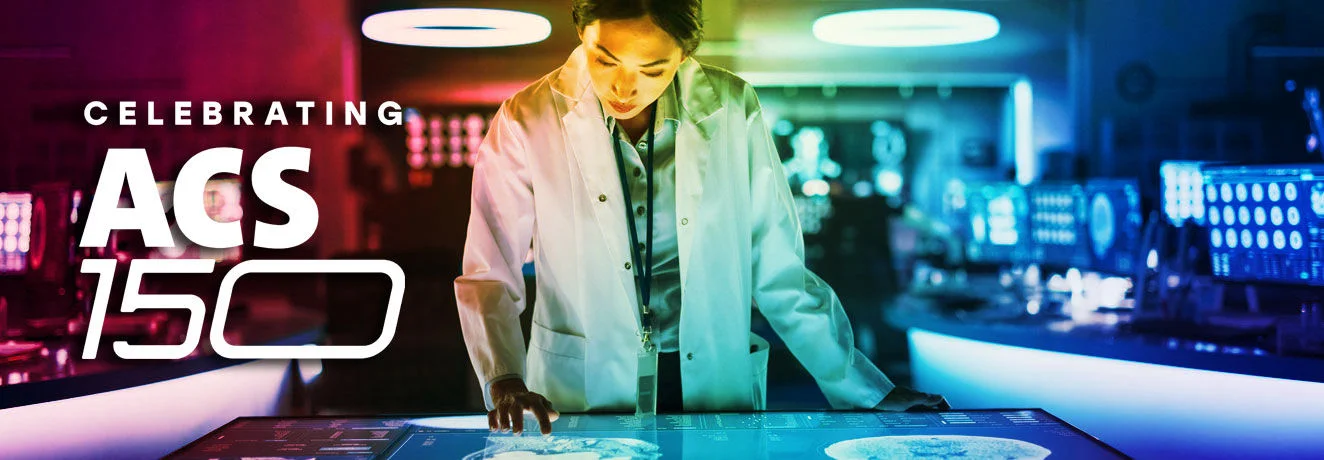 Asian Female Neuroscientist using interactive touch screen table with MRI scans on display in modern biotechnology research center.