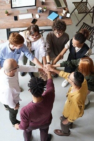 A group with their hands together