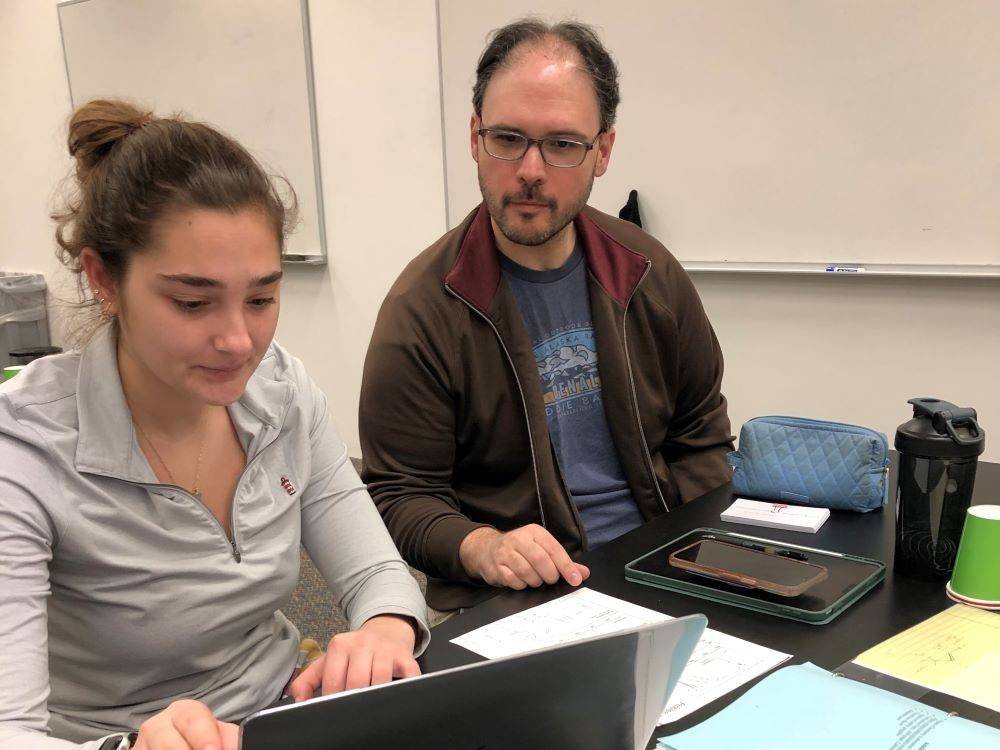 Chemistry department chair Stephen Habay helps a student at the Chemistry Support Center at Salisbury University in Maryland.