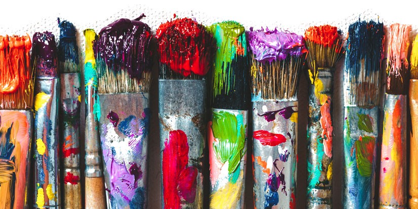 Paint brushes with paint