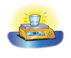 image of a scale displaying 98.3 g