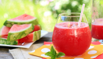 Watermelon Agua Fresca in a glass with a straw