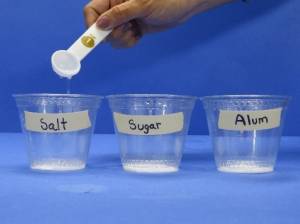 Adding water to salt and other crystals