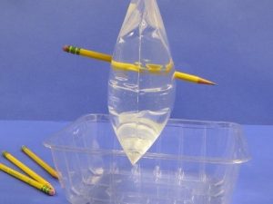 Pencil all the way through a plastic bag of water.