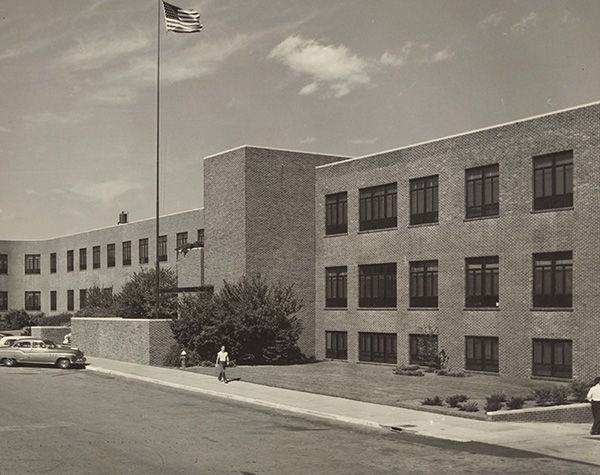 An old black-and-white photo of an office building
