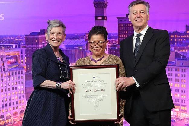 photo of Kimberly M. Jackson presented with her award