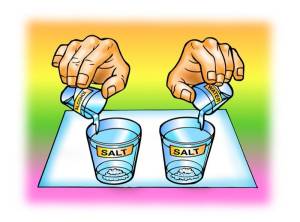 hands mixing salt and water