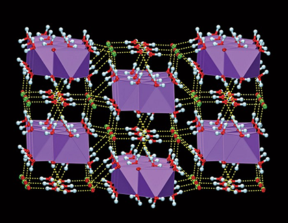 The structure consists of alternating layers of Na+ and ClO– ions “glued” together by water molecules.