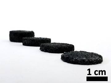 Four black discs of increasing thicknesses, each approximately 2cm wide