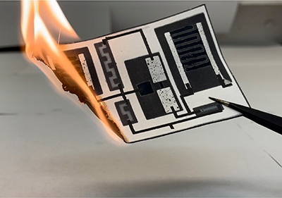 Electronic circuit on paper burns fire on one end