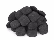 A pile of black, nugget-shaped charcoal briquettes