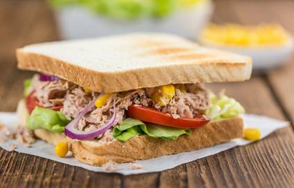 A photo of a tuna salad sandwich on toasted bread.