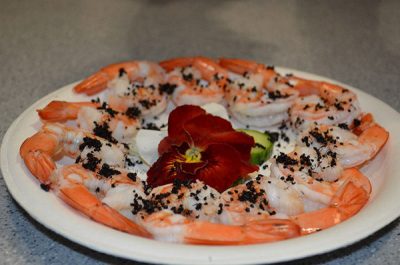 A plate of cocktail shrimp seasoned with common black ant.