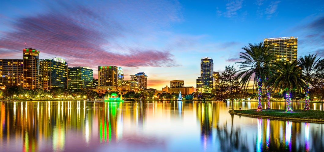 Orlando, Florida downtown city skyline over lake  